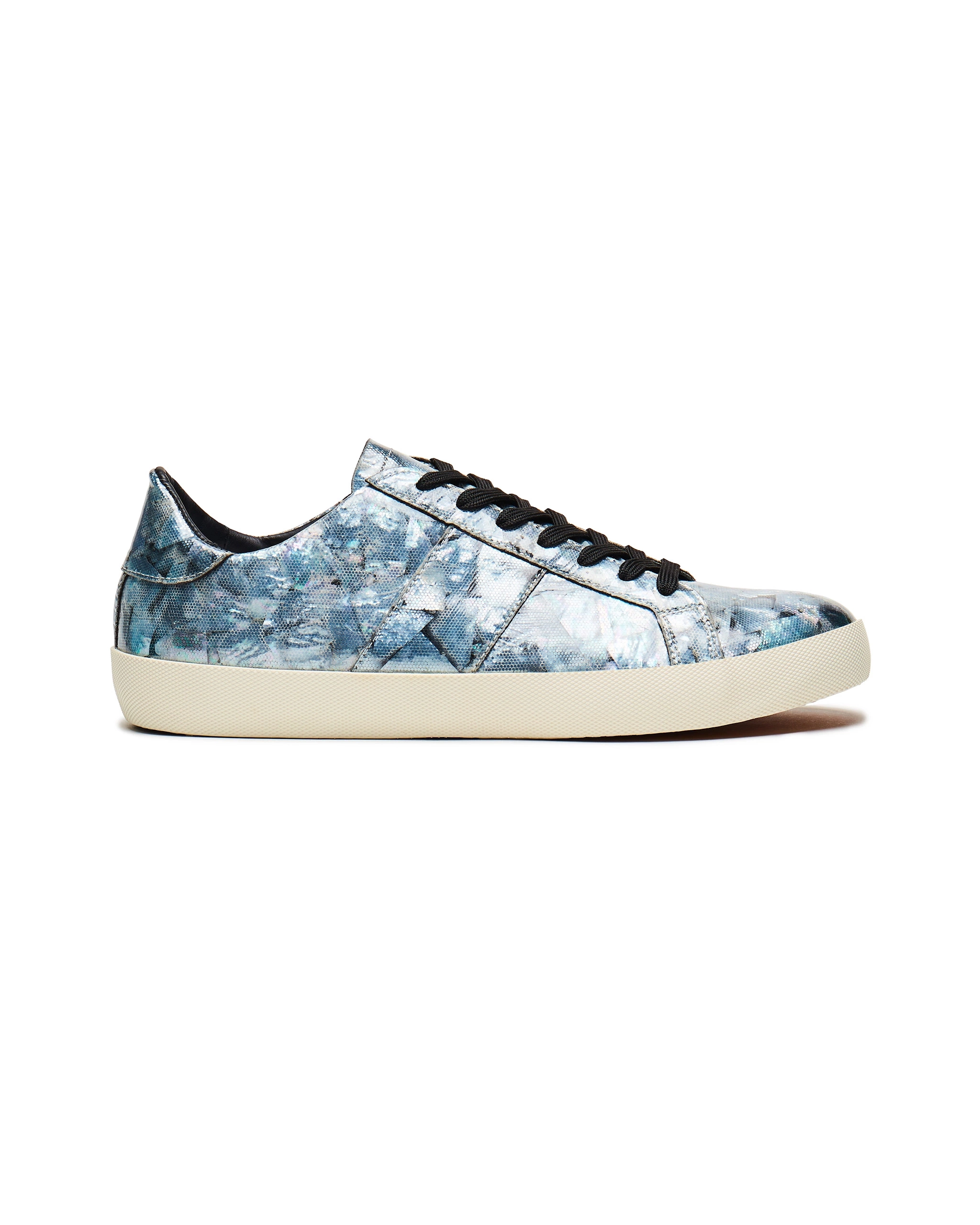a blue and white mother of pearl shoe