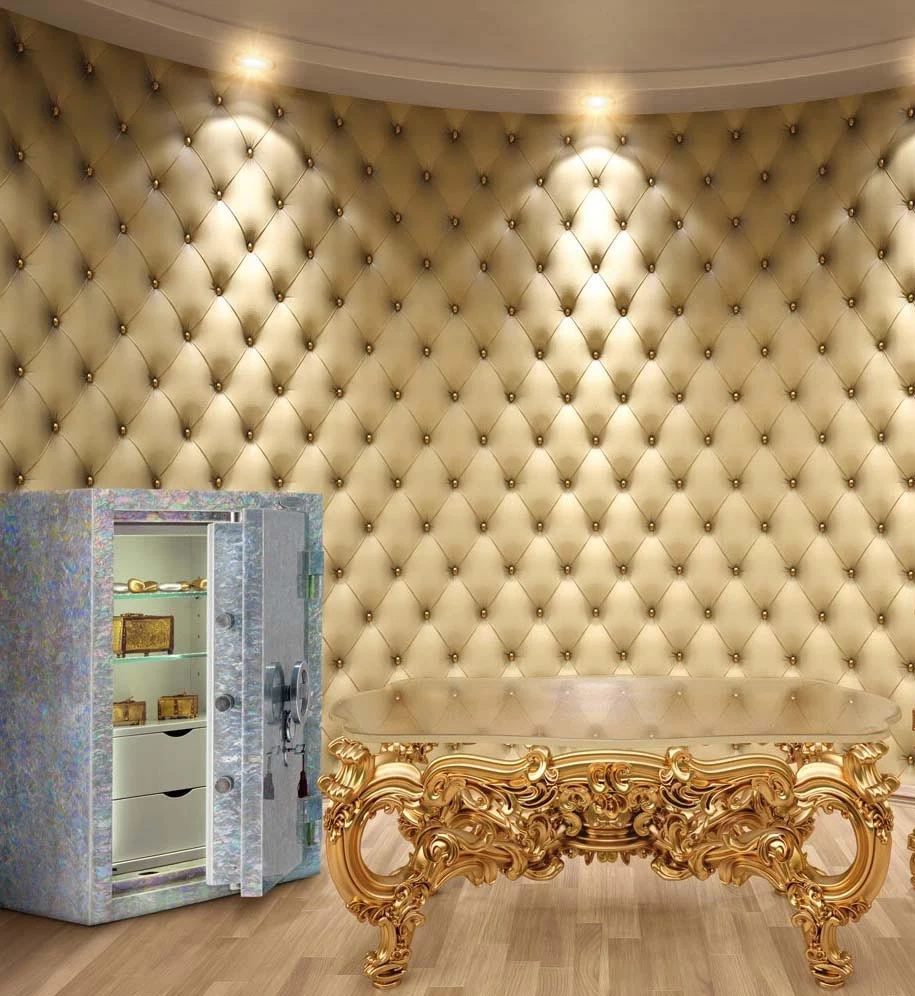 a gold table in a room with a white wall and a white cabinet